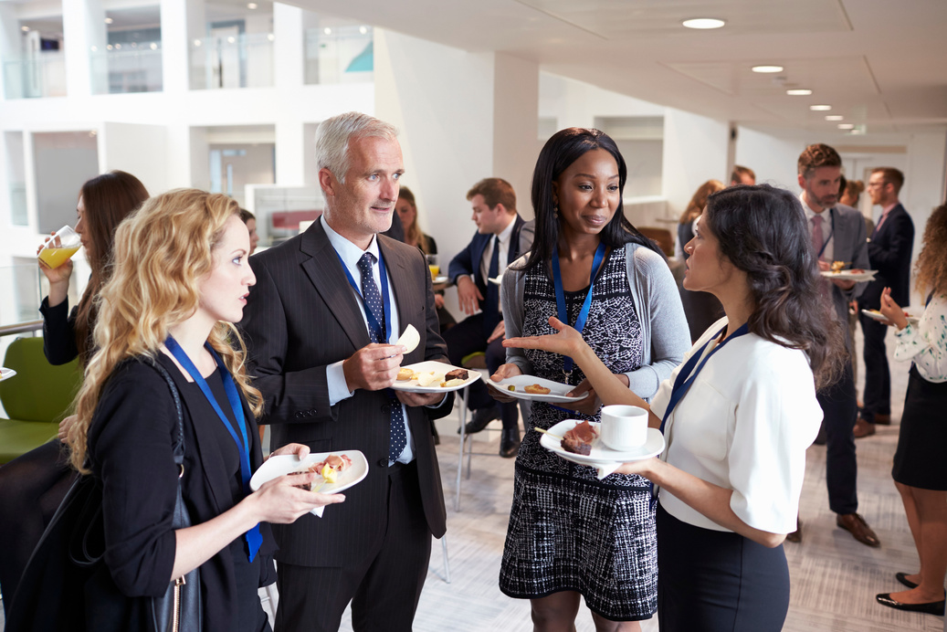 Delegates Networking During Conference Lunch Break